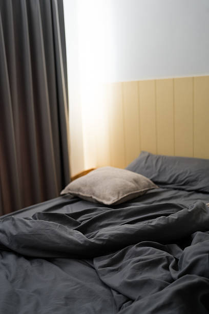 istock Used bed in bedroom 2207913825