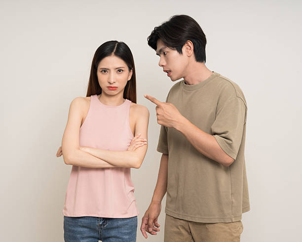 istock Bad relationship unhappy asian couple quarreling in various action gesture standing on isolated white background. Shouting angry man and woman stressed has problem in Married life 2207917320