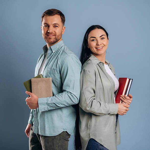 istock Education concept, ready for university. Man and woman are in the studio 2207920302