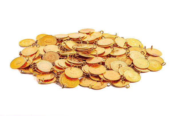 istock A pile of gold quarters 2207921489