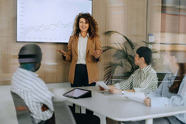 Successful female entrepreneur presenting company growth strategy