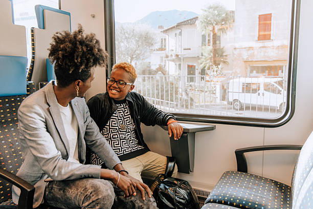 istock Father and Son Sharing a Joyful Moment on Train Journey 2207922915