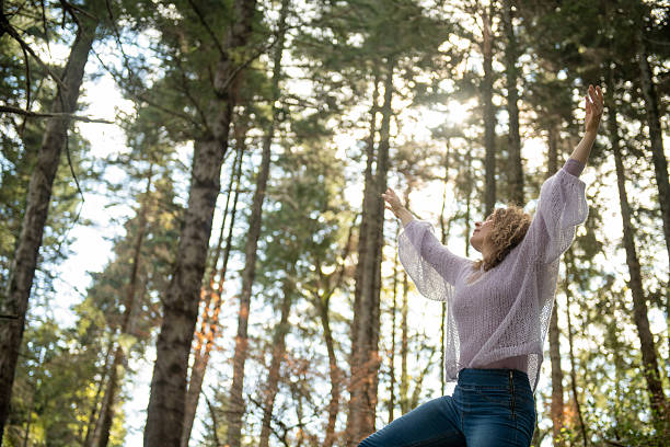 istock Woman embracing the nature 2207922995