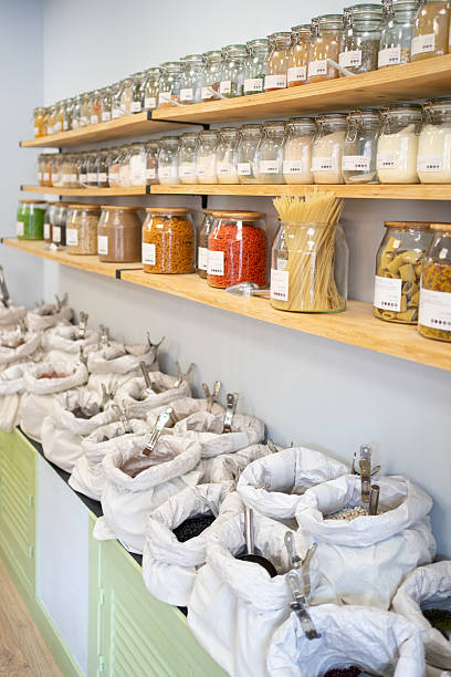 istock Zero waste grocery store displaying food in sustainable reusable containers 2207923897