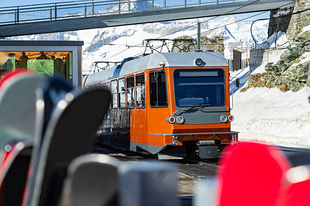 People at Gornergrat railway station (3.089 m) above Zermatt town in Mattertal, Valais canton, Switzerland, in winter.