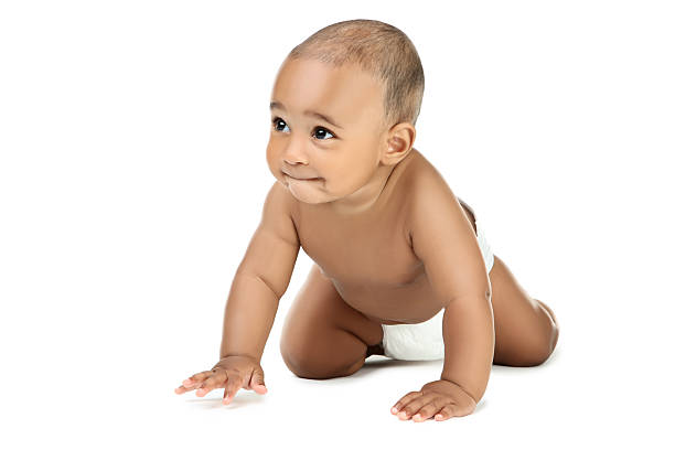 Multiracial baby girl against white background