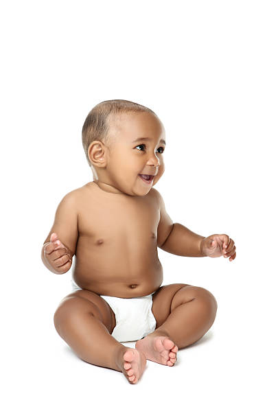 istock Multiracial baby girl against white background 2207926100