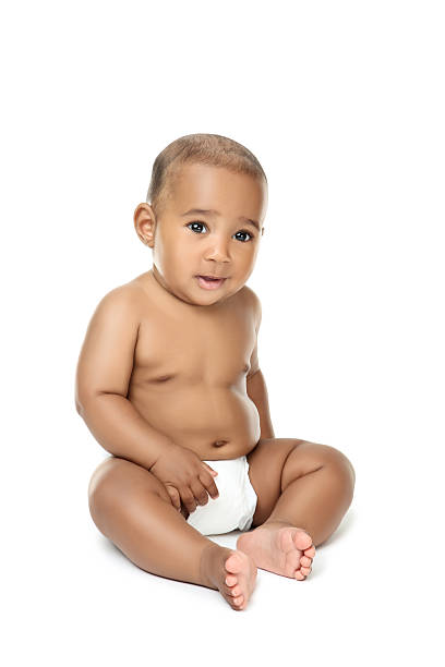 istock Multiracial baby girl against white background 2207926374