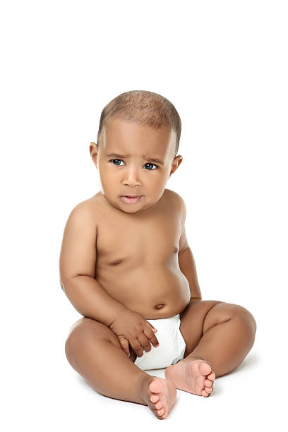 istock Multiracial baby girl against white background 2207926421