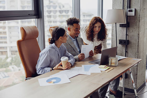 istock Engaging Collaborative Business Meeting Taking Place in a Modern Office Space Environment 2207927946