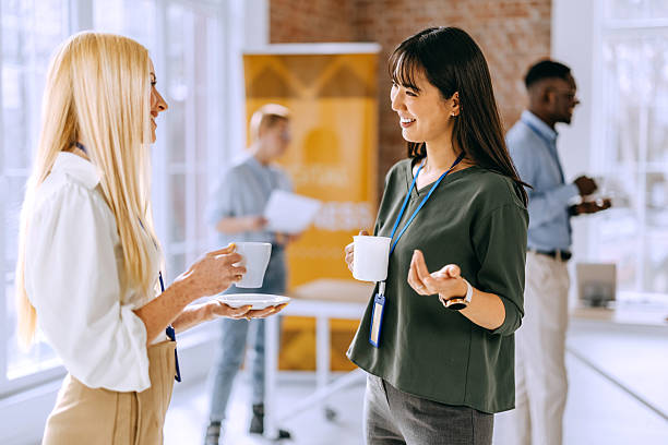istock Two female colleagues enjoying a coffee break during a conference 2207927958