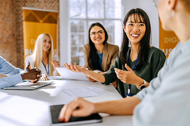 istock Team members discussing during a meeting at a conference event 2207927976