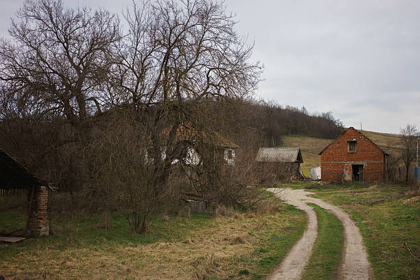 Winding dirt road to the houses in the city