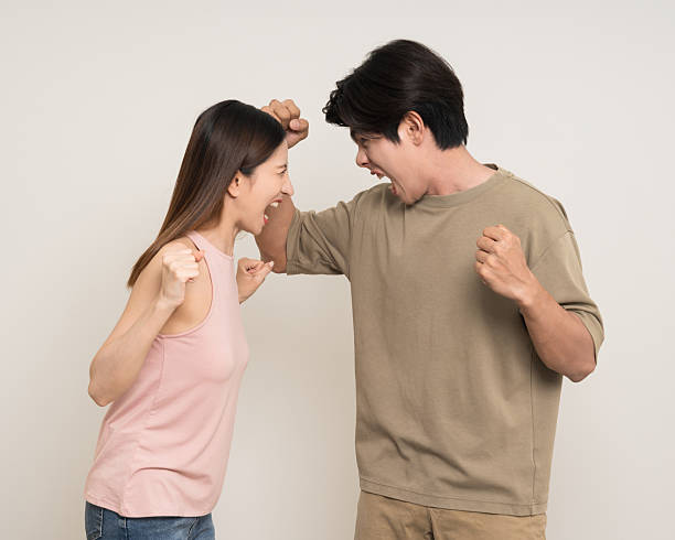 istock Bad relationship unhappy asian couple quarreling in various action gesture standing on isolated white background. Shouting angry man and woman stressed has problem in Married life 2207928270