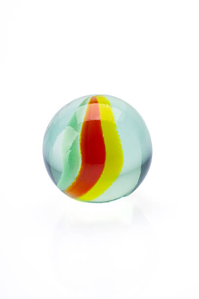 istock Colored glass marbles ball on white background 2207928772