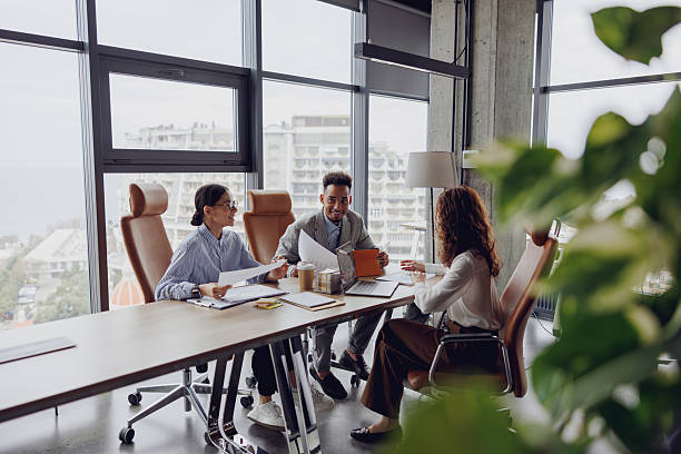 istock Engaging Team Meeting in a Modern and Innovative Office Environment for Effective Collaboration 2207931824