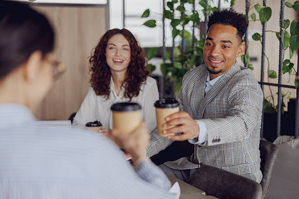 istock A coffee meeting with friends in a modern workspace can be relaxing and productive 2207934356