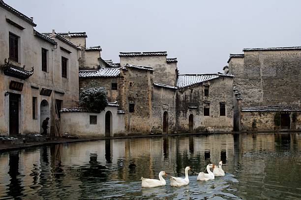Ancient Hongcun village in Mount Huangshan City, Anhui, China, showcases Hui style architecture and is a world intangible cultural heritage site.
