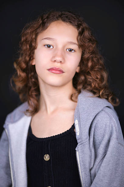 istock Ten year old brunette wearing a hoodie 2207943761