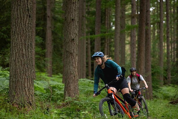 Two Girls Tackling Mountain Biking Trails