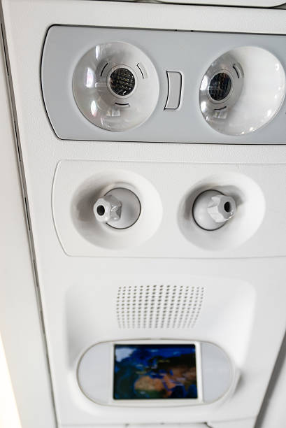 istock Interior inside of the plane. Air conditioning. 2207944584