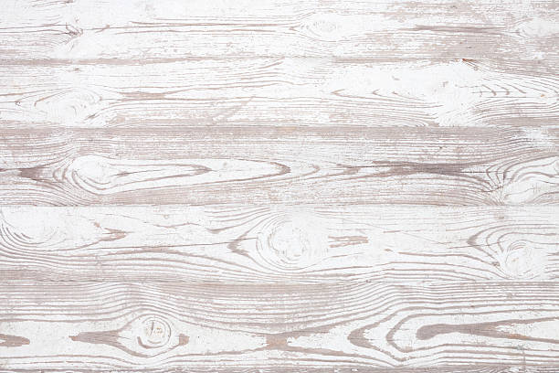 Grunge background. Peeling paint on an old wooden floor.