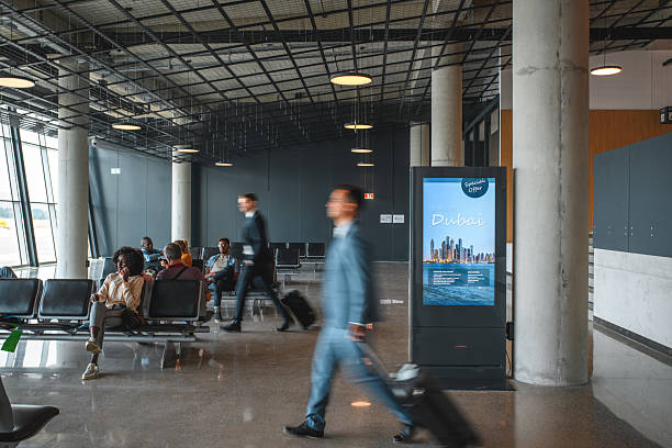 istock Asian Businessman At Departures Terminal 2207945301