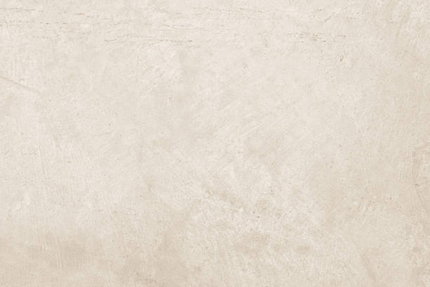 istock Colour old concrete wall texture background. Close up retro plain cream color cement wall background texture. Design paper vintage parchment element. 2207945951