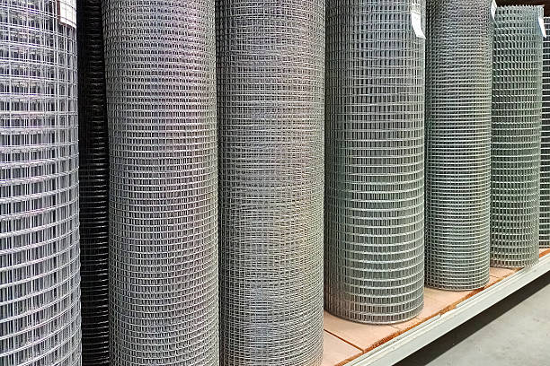 Rows of Industrial Wire Mesh Rolls Organized on Shelves