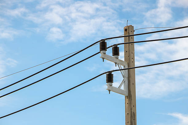 istock electric poles and power lines with the blue sky 2207953086