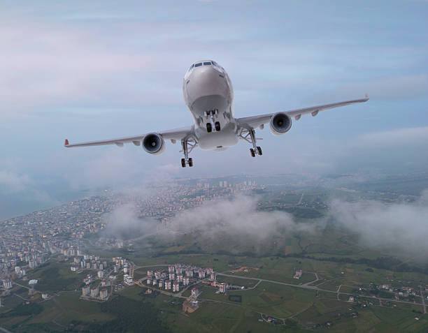 istock Passenger plane taking off over the city 2207953976