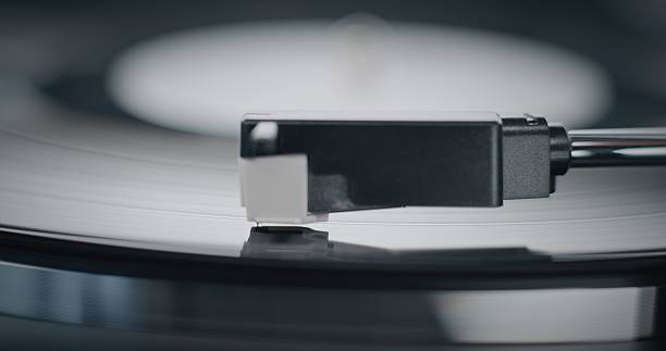 istock Stylus Needle Touching Grooves, Playing Sound on Vinyl Record Player 2207955701