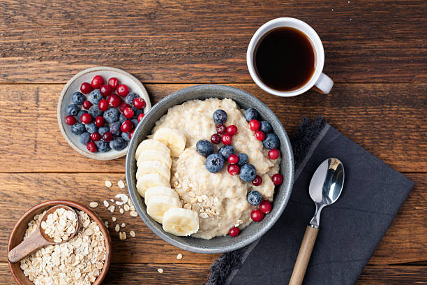 istock Oatmeal porridge bowl with berries 2207955813