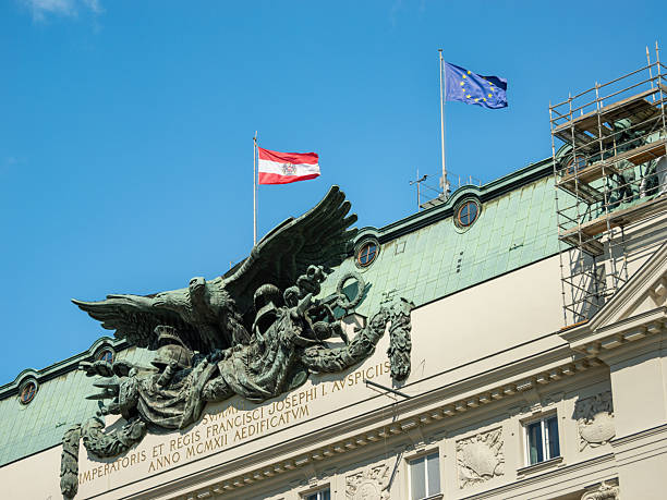 Vienna Kriegsministerium (ministry of war) building exterior at the Stubenring street. Close-up of the bronze sculpture at the facade. The double headed eagle is an artwork.
