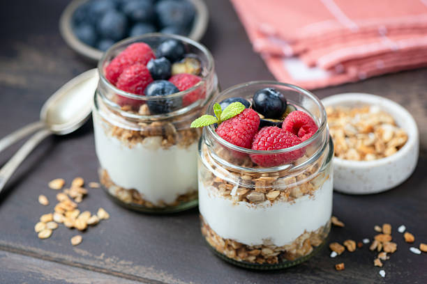 istock Granola and yogurt parfait with berries 2207955958