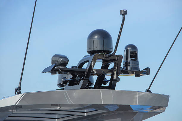 Radar on the roof of a boat with blue sky