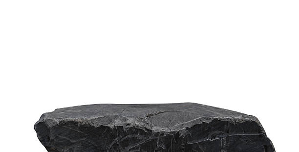 istock Black rock stone isolated white background, Cliff edge black formation well stand display product, cosmetics, Clipping path 2207958342