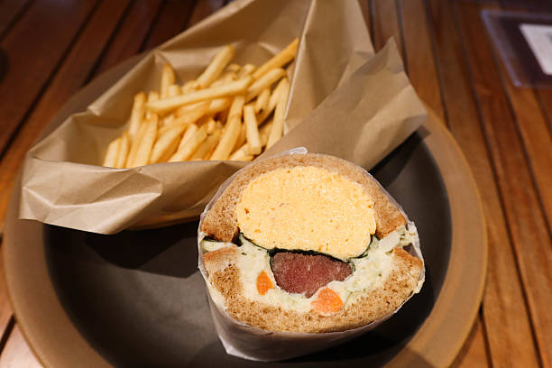 istock a wrapped sandwich filled with Japanese tamago egg, potato salad and cod roe 2207960544