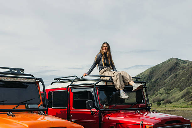istock Traveller Exploring Bromo Volcanic Landscape by 4X4 Car in Indonesia 2207962563