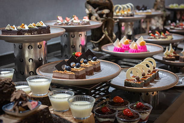 istock Variety of sweets including cakes, eclairs and Turkish sweets, arranged beautifully on a table in a luxury all-inclusive hotel. 2207962711