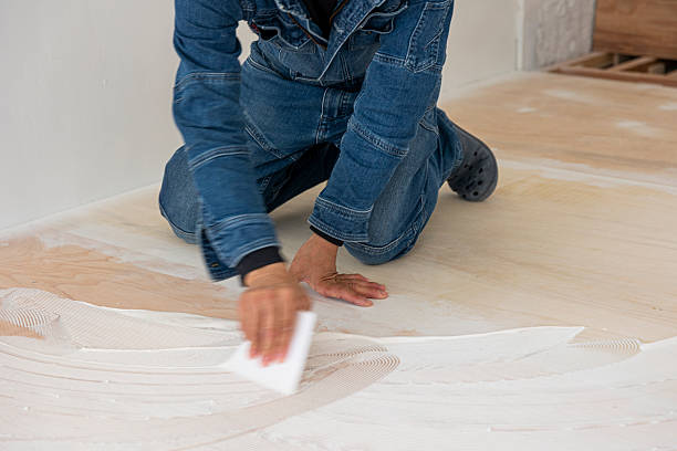 istock Professional Craftsman Installing Cushion Floor – Home Renovation Work 2207963110