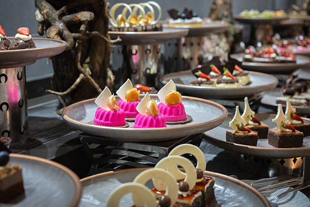 istock Variety of sweets including cakes, eclairs and Turkish sweets, arranged beautifully on a table in a luxury all-inclusive hotel. 2207964257