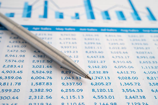 istock Pen on spreadsheet and graph paper. Financial development, Banking Account, Statistic, Investment Analytic research data economy, Business. 2207964887