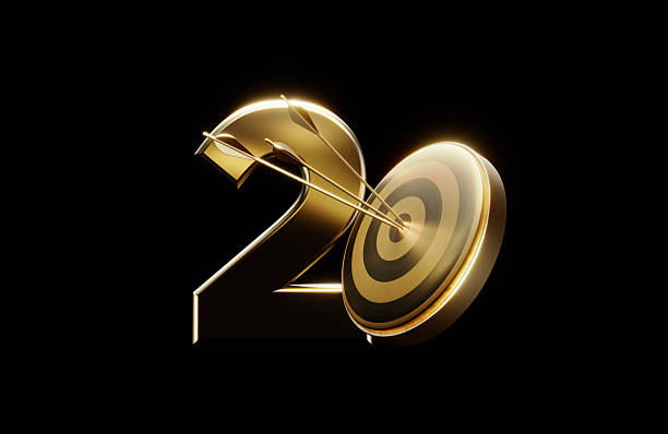 Gold colored number 2 and bulls eye target on black background. Horizontal composition with copy space. Success and strategy concept.