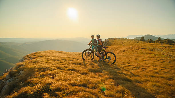 istock Mountain Biking Adventure at Sunset 2207965055