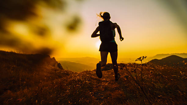istock Trail Runner at Dusk in Mountain Wilderness 2207965239