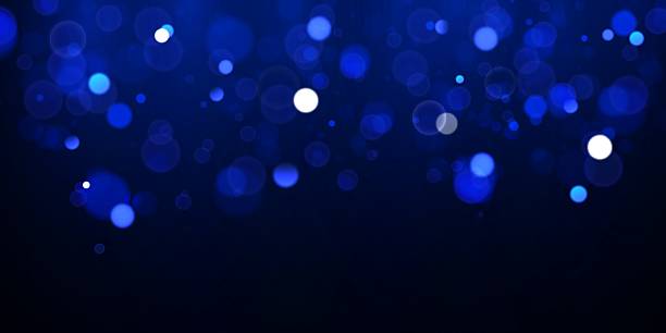 istock Glitter and elegant for Christmas. Abstact bokeh circles. Blue glitter stardust background. Abstract glitter defocused blinking stars and sparks. Vector illustration. 2207968241