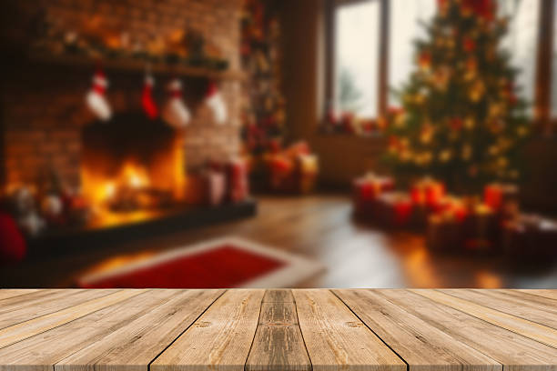 istock Empty table in front of christmas tree with decorations background. For product display montage 2207968983