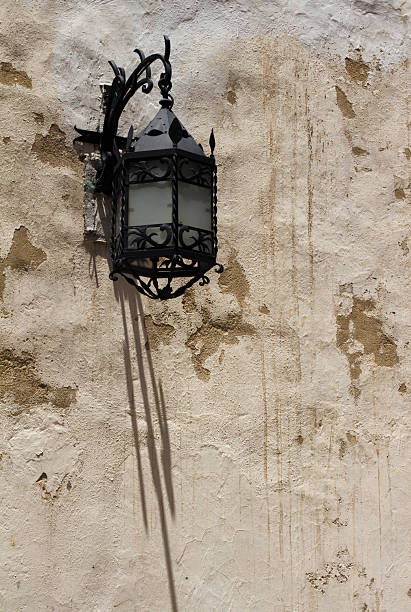 istock Wall lamp and its shadow, Cartagena, Colombia. 2207971057