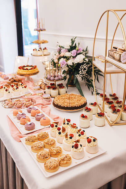 istock Luxurious Wedding Dessert Table – Indulgent Sweets and High-Calorie Treats 2207971108